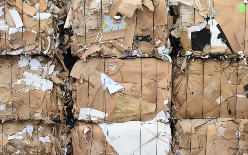 Stacked bales of old corrugated containers