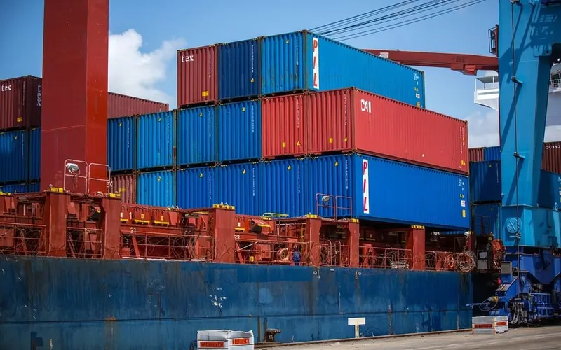 Containers being loaded at a port terminal
